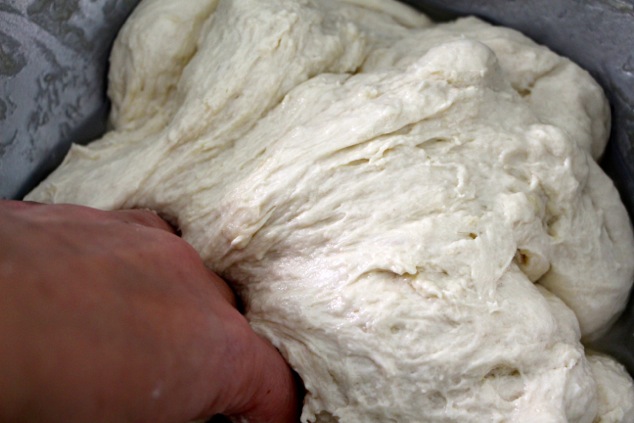 kneading the dough and oil