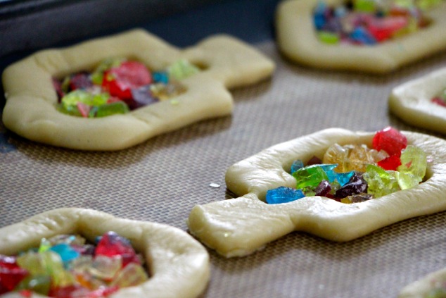 placing-hard-candy-pieces-in-the-dreidel-cookie
