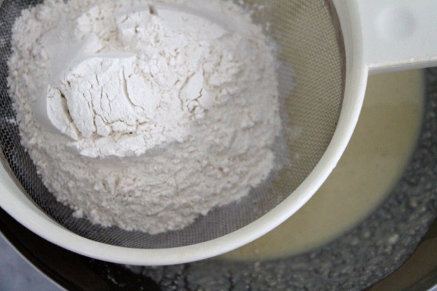 sifting-self-rising-flour-to-mixture