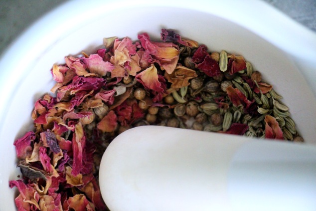 adding dry rose petals up close