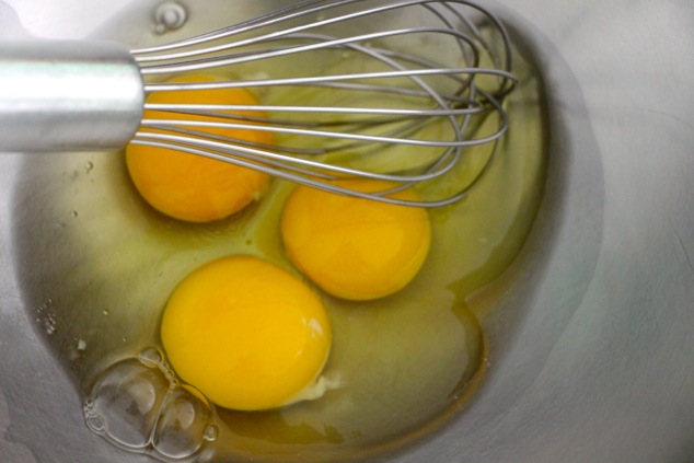 three eggs in a bowl