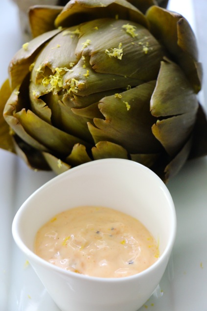 artichoke served with lemon zest and aioli