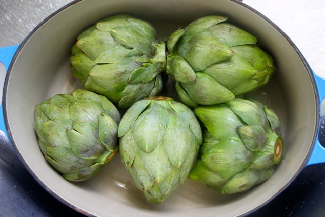 artichokes arranged in a pot