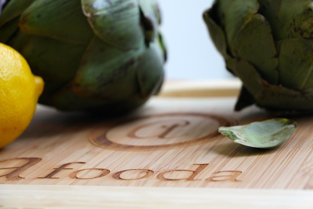 artichokes on afooda cutting board up close