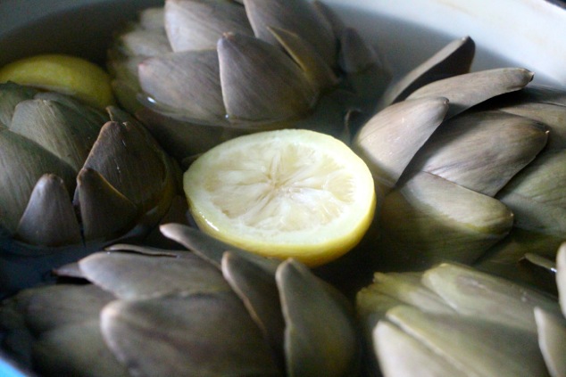 boiled artichokes ready in a pot