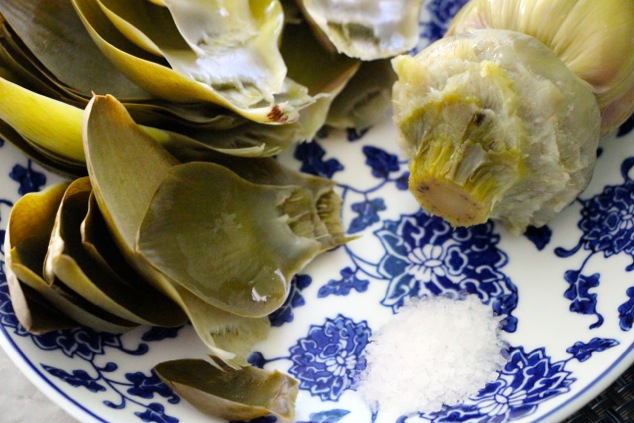 eating artichoke leaves