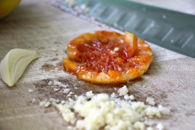 preserved lemon and garlic on a cutting board