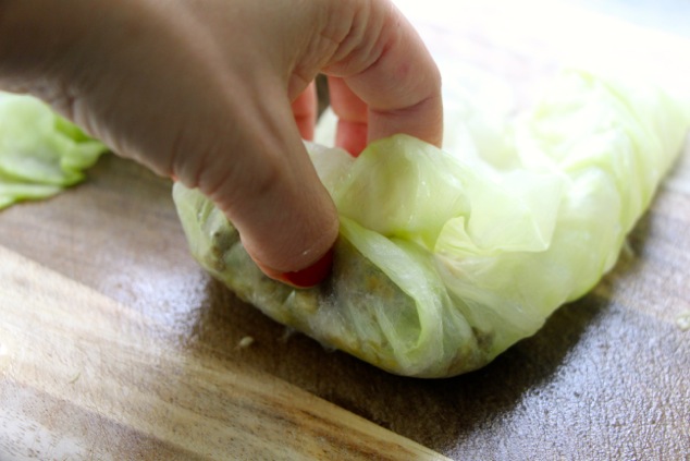 rolling the cabbage leaf