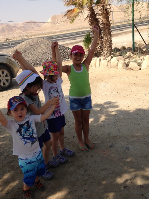 kids at the entrance to restaurant