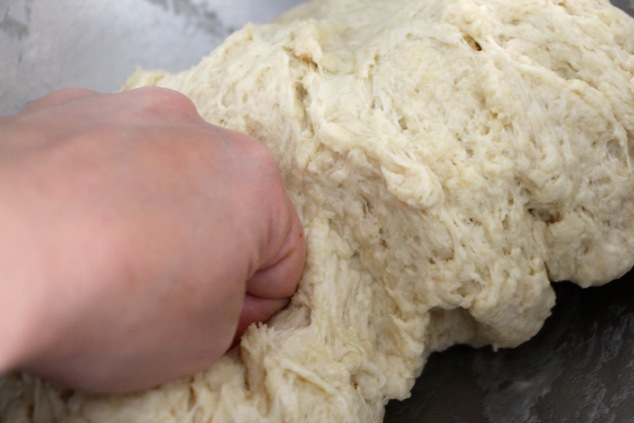 kneading dough up close