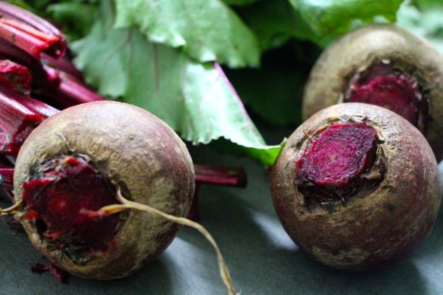 beet bulbs on a cutting board