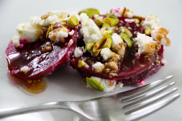 beet goat cheese pistachio salad served