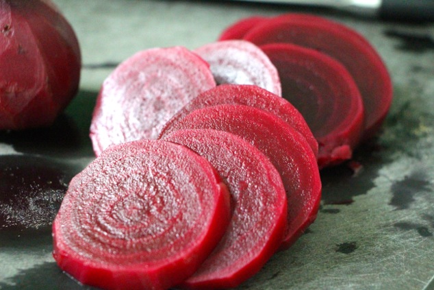 cutting boiled beets into circles