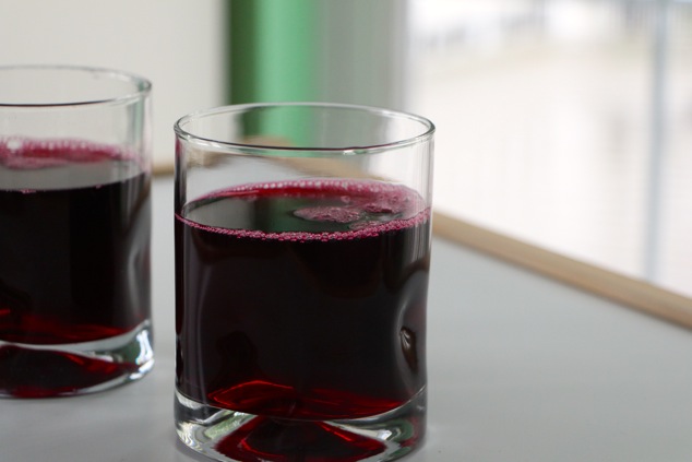 two glasses with beet water