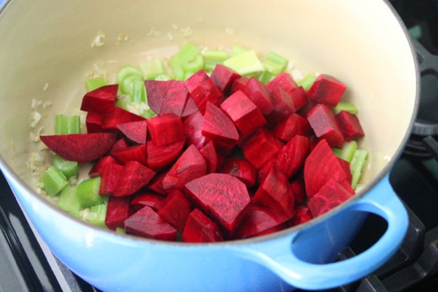 adding beet cubes to the pot