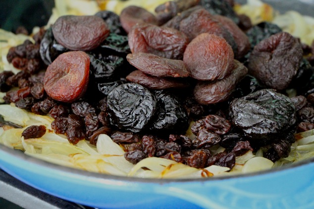 adding dried fruit to pan