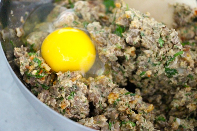 adding egg to Kubbeh filling mixture