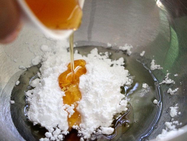 adding honey to egg white mixture