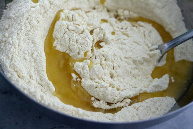 adding oil to semolina