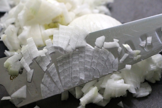 chopping onion up close