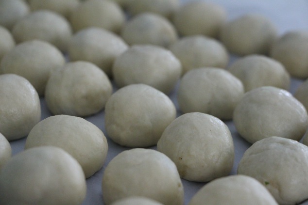 formed Kubbeh on parchment paper