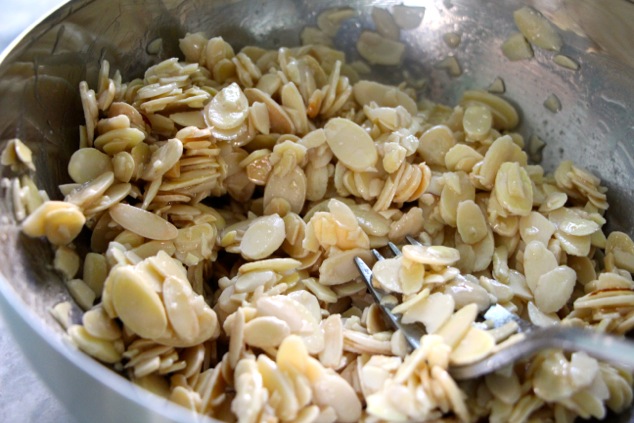 mixing the sliced almonds to coat