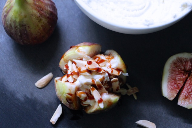 preparing fresh fig on cutting board