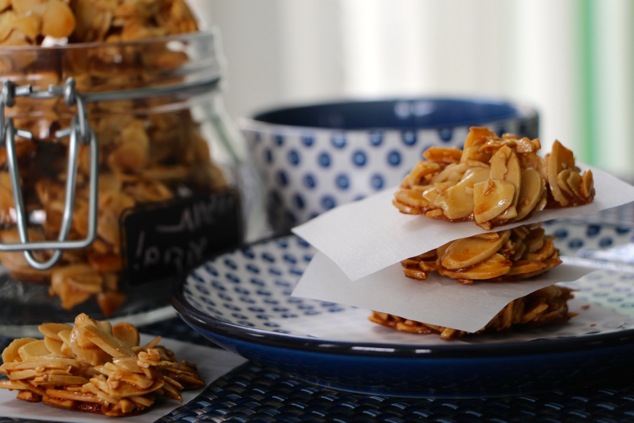 serving sliced almond cookies