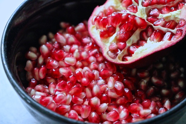 pomegranate seeds in a bowl