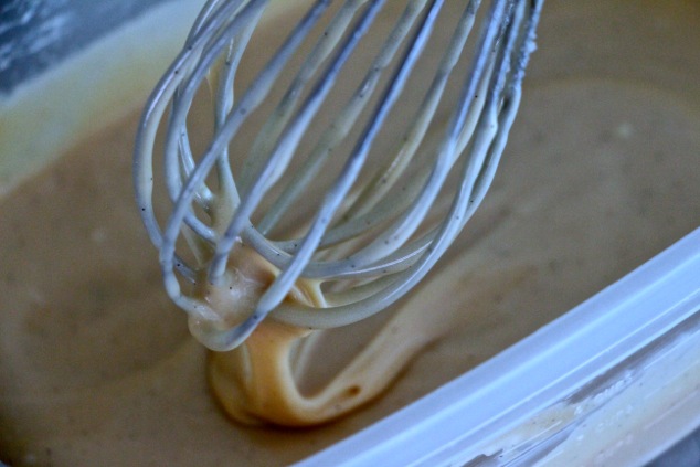 whisking honey vanilla ice cream base up close