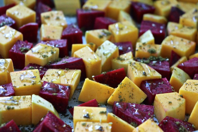 beets and butternut squash cubes with olive oil and zaatar on tray