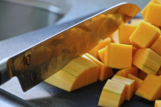 cutting butternut squash into cubes