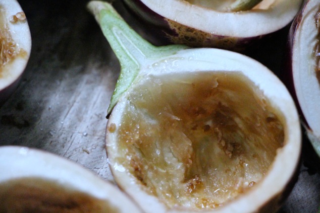 halved empty eggplants with sprinkled salt