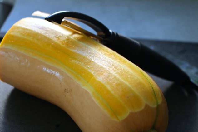 peeling butternut squash