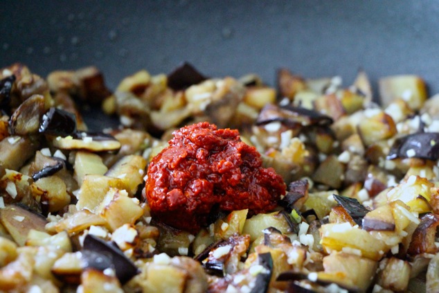 adding Harissa to the pan