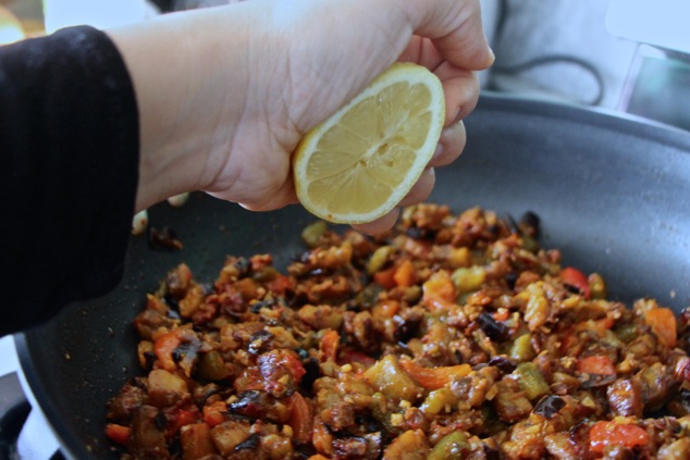 adding freshly squeezed lemon juice