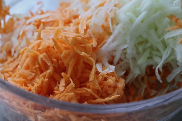 grated sweet potato and kohlrabi in a bowl