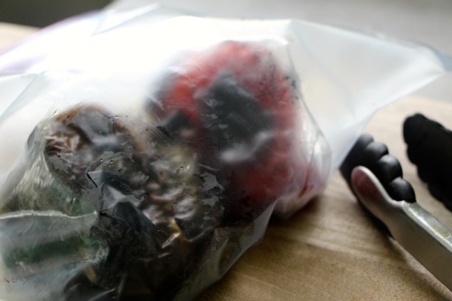 roasted peppers steaming in a sealed bag