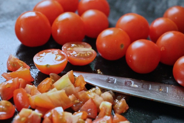 chopping cherry tomatoes