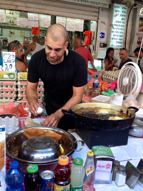 making Brik Burika in the market