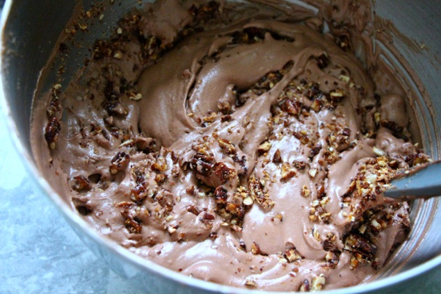 folding caramelized pecans into Nutella mousse