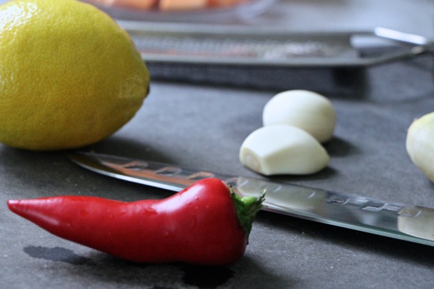 red hot fresno pepper on cutting board