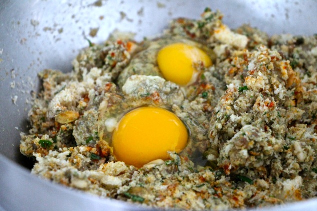 adding eggs to vegetarian kabob mixture