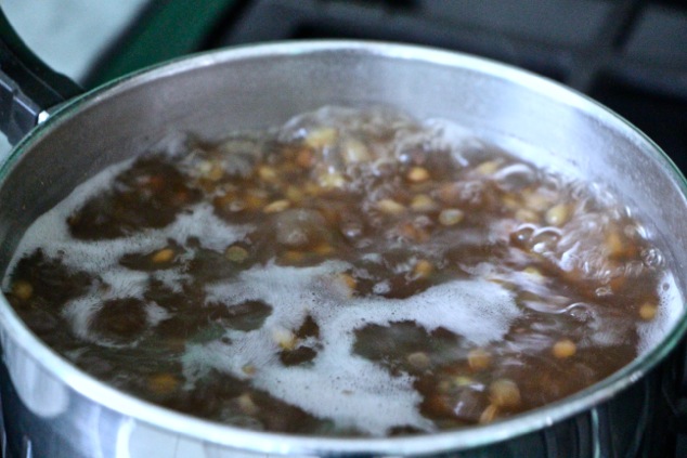 boiling lentils in a pot