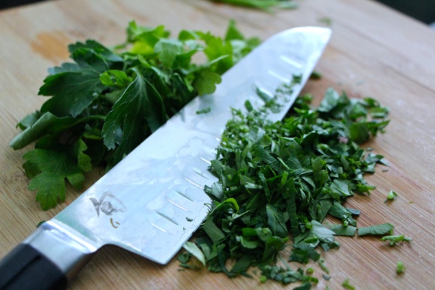 chopping fresh parsley