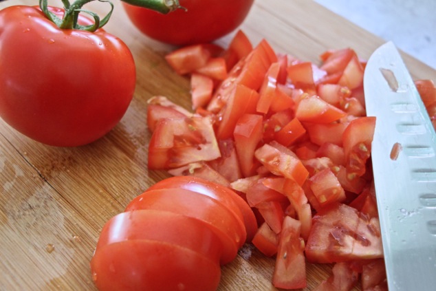 cutting tomatoes into cubes