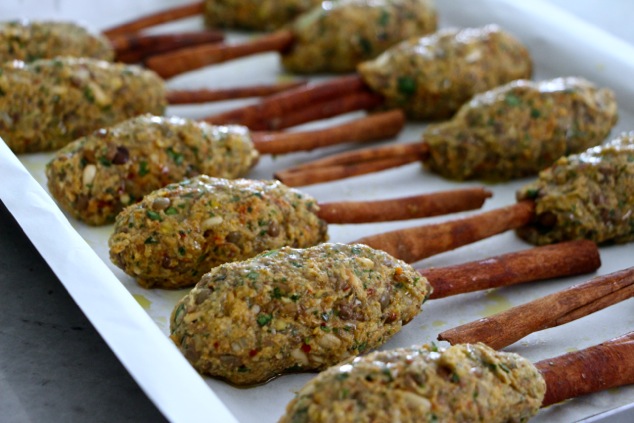 forming vegetarian kabobs on cinnamon sticks