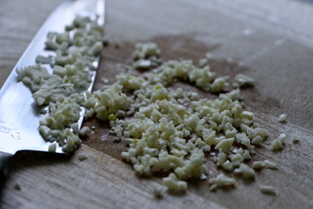 minced garlic on cutting board