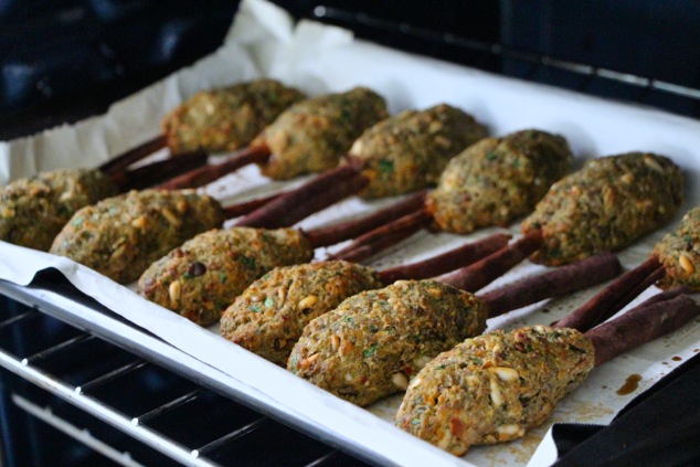 vegetarian kabobs on cinnamon sticks in the oven