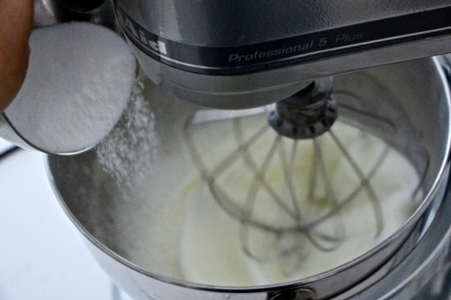 adding sugar gradually to egg whites